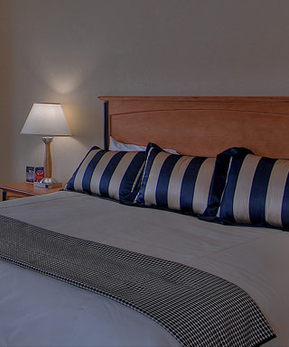 The king sized bed inside the king hotel room at Hollywood Casino hotel in Bangor, Maine.