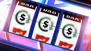Real Time Rewards logos on a slot machine reel.