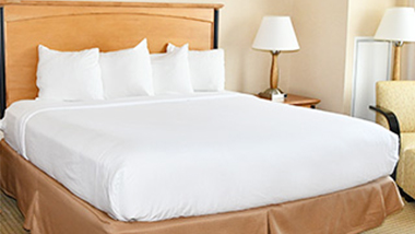 King size bed in hotel room