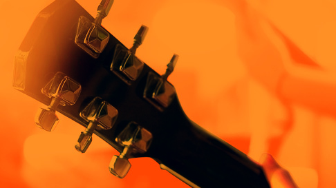Guitar neck, orange background